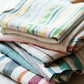 LAPUAN - LEWA LINEN HAND TOWEL. YELLOW + GREEN